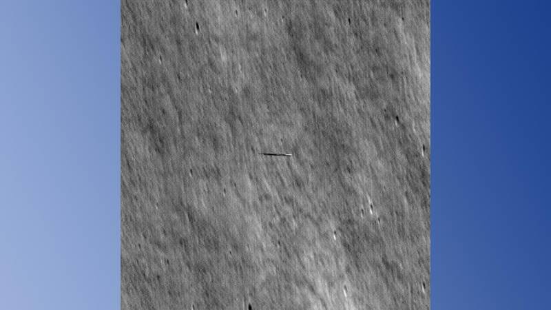 The Danuri as seen above the surface of the moon.