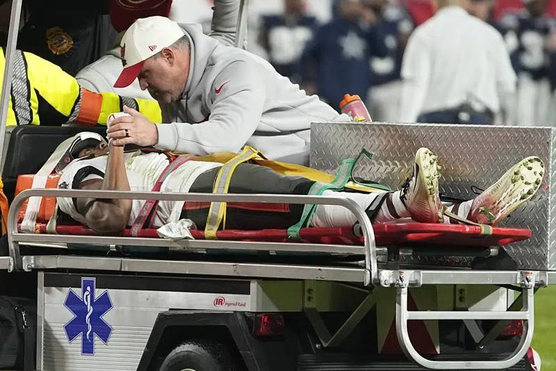 Tampa Bay Buccaneers wide receiver Russell Gage is taken off the filed after being injured against the Dallas Cowboys during the second half of an NFL wild-card football game, Monday, Jan. 16, 2023, in Tampa, Fla.
