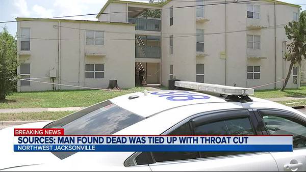 Sources: Man found dead was tied up with throat cut