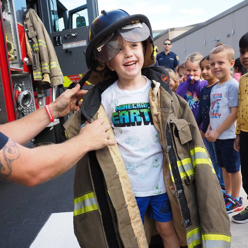 This young man got to try on some of Station 17's turnout gear.