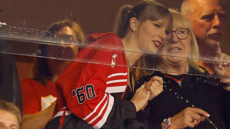 KANSAS CITY, MISSOURI - OCTOBER 12: Taylor Swift and Donna Kelce look on before the game between the Kansas City Chiefs and the Denver Broncos at GEHA Field at Arrowhead Stadium on October 12, 2023 in Kansas City, Missouri. (Photo by David Eulitt/Getty Images)