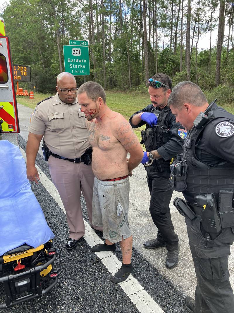 Florida Highway Patrol said it has captured an at-large suspect who ran into the woods off Interstate 10 East on Thursday morning.