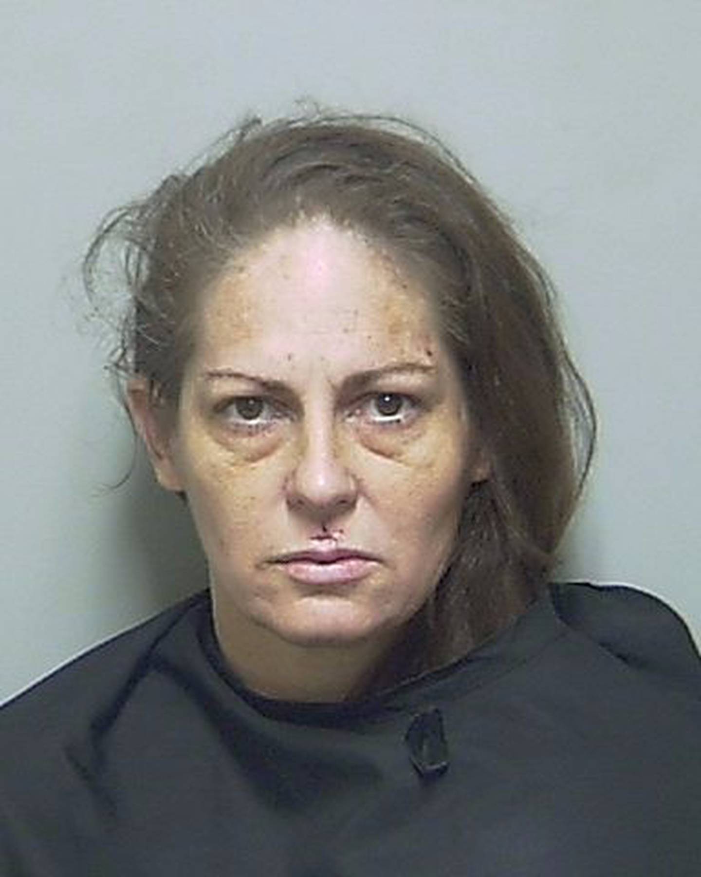 Tracy Wilson was also charged with attempting to smuggle pills into jail after her initial arrest.