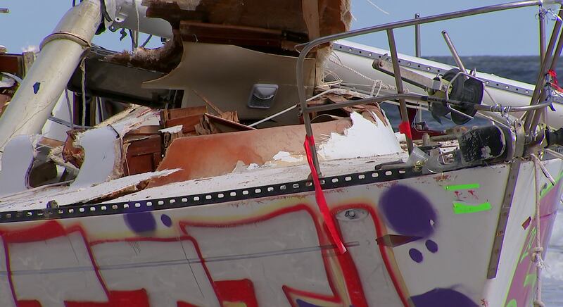 Crews came Tuesday to remove a sailboat that washed ashore on Jacksonville Beach in October.