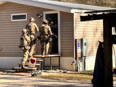 SWAT conducted a search warrant at a home in Lawtey and recovered over 20 guns and drugs.