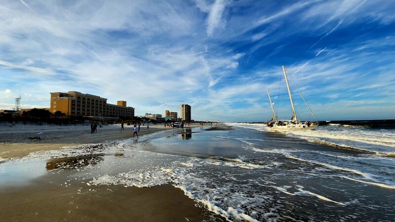 A sailboat got stuck on shore on Jacksonville Beach near 15th Avenue North near the Hampton Inn Jacksonville Beach/Oceanfront in the area of 1st Street North on Monday evening, 10/23/23.