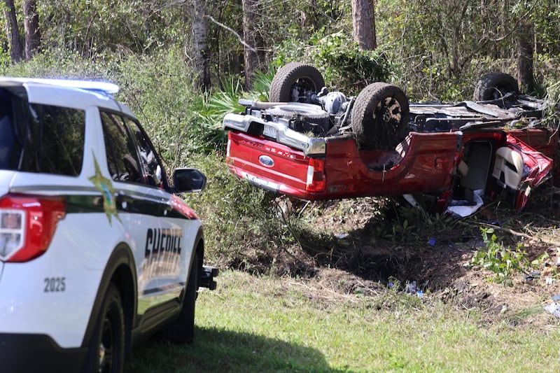 A suspect in a red truck who deputies say was pointing a gun at other cars on Interstate 95 southbound was taken to the hospital after crashing, the St. Johns County Sheriff’s Office said in a social post.