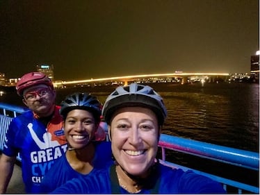 The Acosta Bridge was lit up Tuesday night in gold and orange to shine a light on pediatric cancer. “Team Joe Strong” rode bicycles across the bridge in memory of Joe Dewaele.