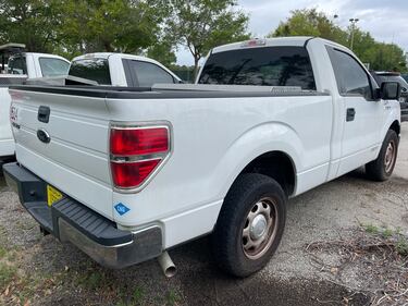 How about a 2014 Ford F150 XL with a toolbox installed?