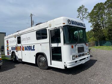 This 1997 Blue Bird Bus will be on the auction block.