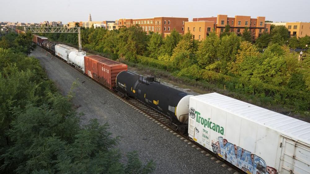 A CSX freight train travels through Alexandria, Va. on Thursday, Sept. 15, 2022. President Joe Biden said Thursday that a tentative railway labor agreement has been reached, averting a strike that could have been devastating to the economy before the pivotal midterm elections.