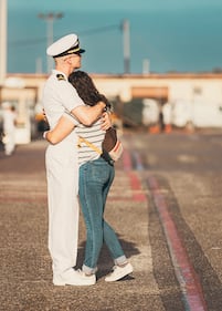 More love shared on the docks before USS Mason deploys to the Mediterranean.