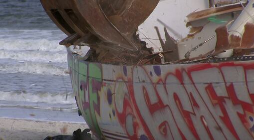 Crews came Tuesday to remove a sailboat that washed ashore on Jacksonville Beach in October.