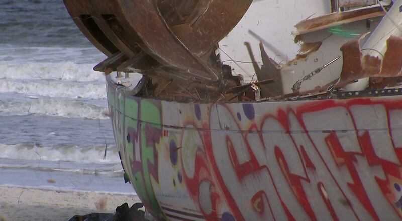 Crews came Tuesday to remove a sailboat that washed ashore on Jacksonville Beach in October.