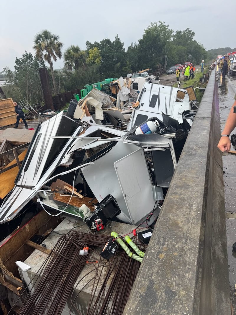 Authorities are responding to a crash on Interstate 95 southbound near the Duval-Nassau county line. The Nassau County Sheriff’s Office said a truck pulling a camper flipped over the bridge near mile marker 370.