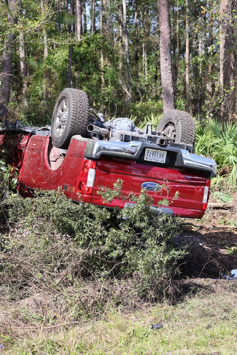 A suspect in a red truck who deputies say was pointing a gun at other cars on Interstate 95 southbound was taken to the hospital after crashing, the St. Johns County Sheriff’s Office said in a social post.