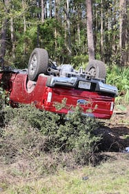 A suspect in a red truck who deputies say was pointing a gun at other cars on Interstate 95 southbound was taken to the hospital after crashing, the St. Johns County Sheriff’s Office said in a social post.