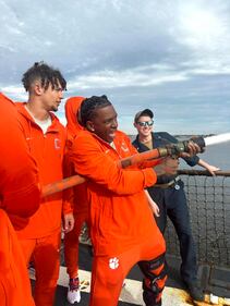 Tigers players taking the high pressure fire hose for a test drive.