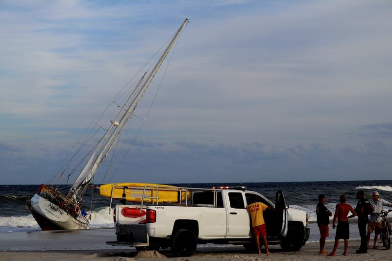 A sailboat got stuck on shore on Jacksonville Beach near 15th Avenue North near the Hampton Inn Jacksonville Beach/Oceanfront in the area of 1st Street North on Monday evening, 10/23/23.