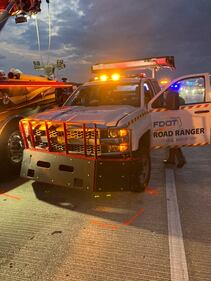 According to the FHP report, at approximately 3:27 a.m., a collision occurred between Chevrolet FDOT Road Ranger pickup truck and a Toyota pickup truck.