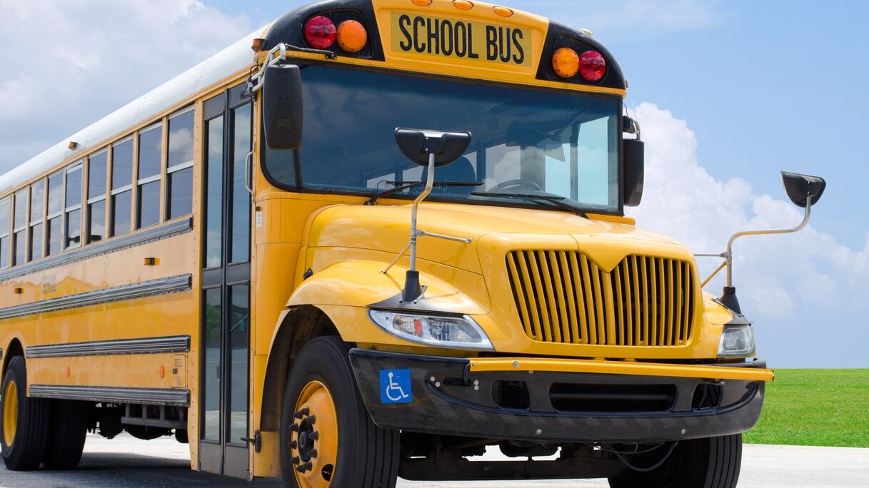 At least two people were killed after a school bus crashed with a cement truck in Bastrop County, Texas Friday afternoon.