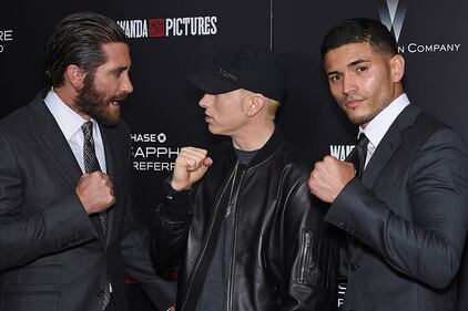 NEW YORK, NY - JULY 20: (L-R) Jake Gyllenhaal, Eminem, and Miguel Gomez attend the "Southpaw" New York Premiere at AMC Loews Lincoln Square on July 20, 2015 in New York City. (Photo by Dimitrios Kambouris/Getty Images)