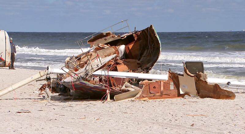 Crews came Tuesday to remove a sailboat that washed ashore on Jacksonville Beach in October.