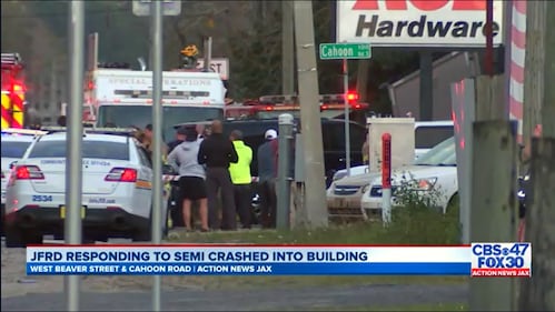 The Jacksonville Fire and Rescue Department responded early evening Friday, Jan. 14 to a semi that crashed into a building at Cahoon Road and Beaver Street.