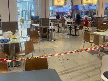 Blood could be seen on the floor in the food court of the Avenues Mall on Friday, Dec. 1, 2023.