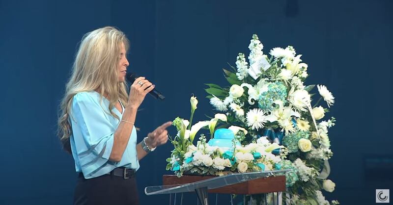 Patriot Oaks Academy principal Allison Olson speaks at the memorial service of Tristyn Bailey at Celebration Church on May 18, 2021. Tristyn was a student at the school.