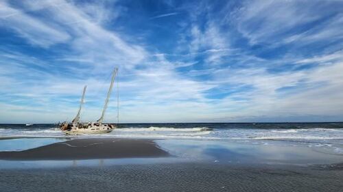 A sailboat got stuck on shore on Jacksonville Beach near 15th Avenue North near the Hampton Inn Jacksonville Beach/Oceanfront in the area of 1st Street North on Monday evening, 10/23/23.