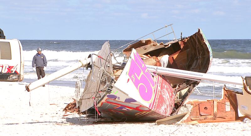 Crews came Tuesday to remove a sailboat that washed ashore on Jacksonville Beach in October.