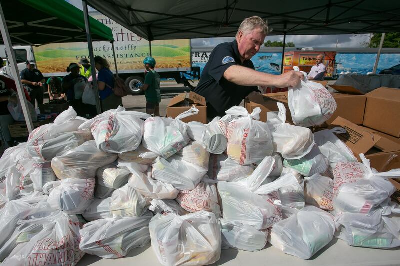 On the 2nd and 4th Thursday of every month, multiple partners supply free groceries and pet supplies to military families.