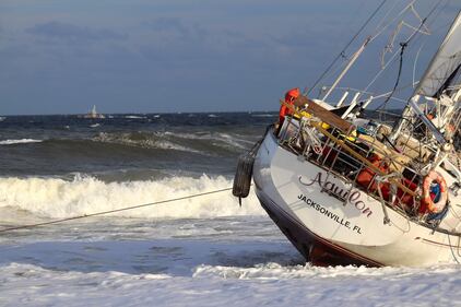 A sailboat got stuck on shore on Jacksonville Beach near 15th Avenue North near the Hampton Inn Jacksonville Beach/Oceanfront in the area of 1st Street North on Monday evening, 10/23/23.