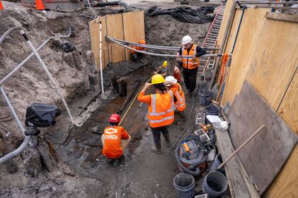 SEARCH’s Dr. James Delgado confers with the team as excavation has revealed the interior of the vessel for the first time since it was likely abandoned in the 19th century on what was then a shoreline.