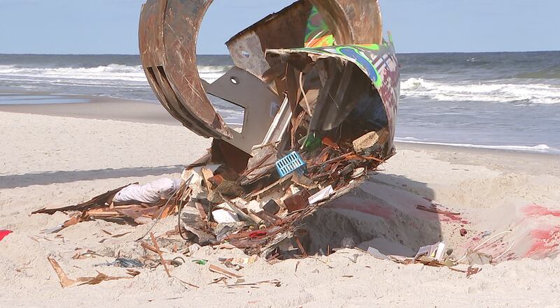 Crews came Tuesday to remove a sailboat that washed ashore on Jacksonville Beach in October.