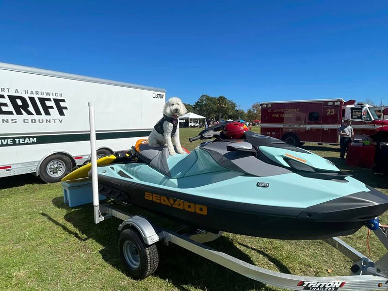 Sandy takes a quick break, thinking of the next time she can take the Seadoo ski out for a spin.