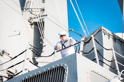 USS Mason sailor gets ready to head on out from port.