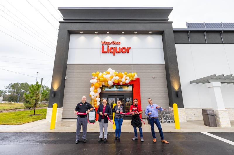 Ribbon cutting ceremony before the doors opened at Grand Cypress location on Wed., Dec. 14.