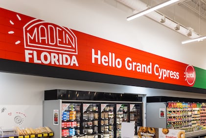 Ribbon cutting ceremony before the doors opened at Grand Cypress location on Wed., Dec. 14.