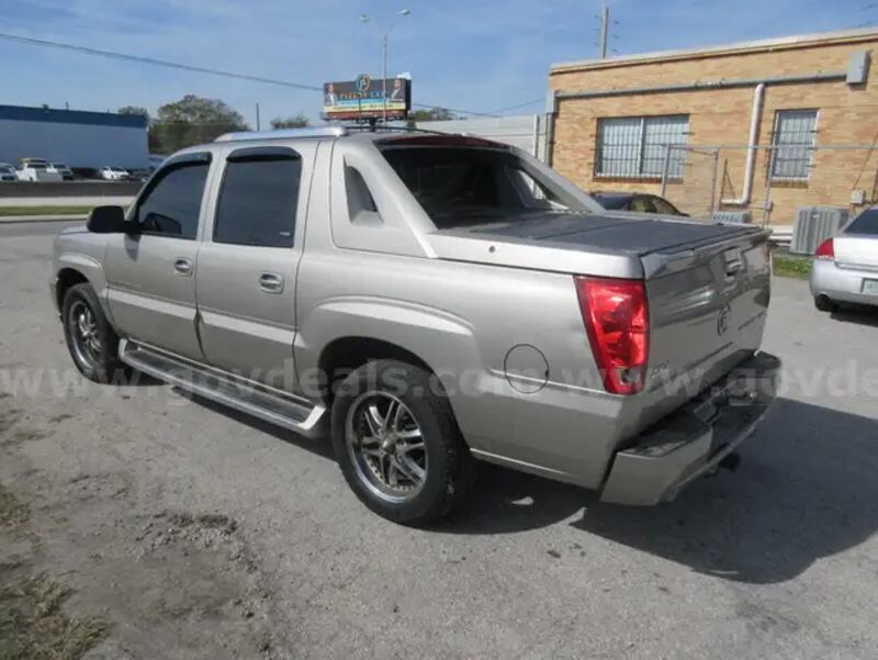 This 2002 Cadillac Escalade EXT is ready to be bid on.