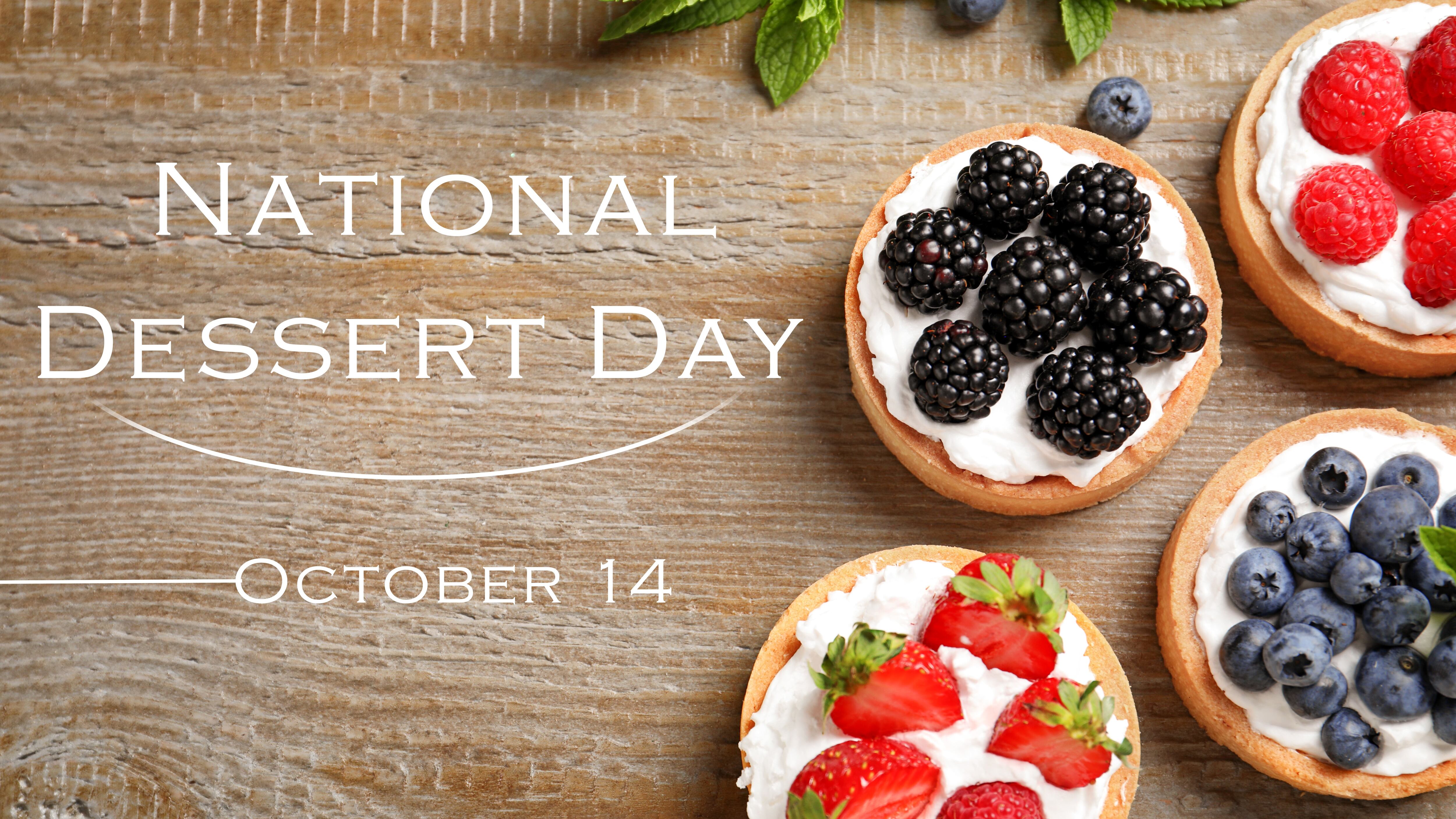 Tasty tartlets with different fresh berries on wooden table, flat lay