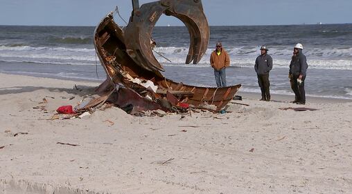 Crews came Tuesday to remove a sailboat that washed ashore on Jacksonville Beach in October.