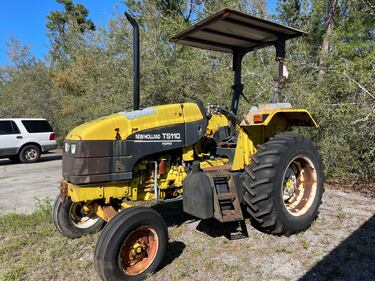 Need a tractor for some heavy work? This New Holland TS110 Ford tractor needs a new home.