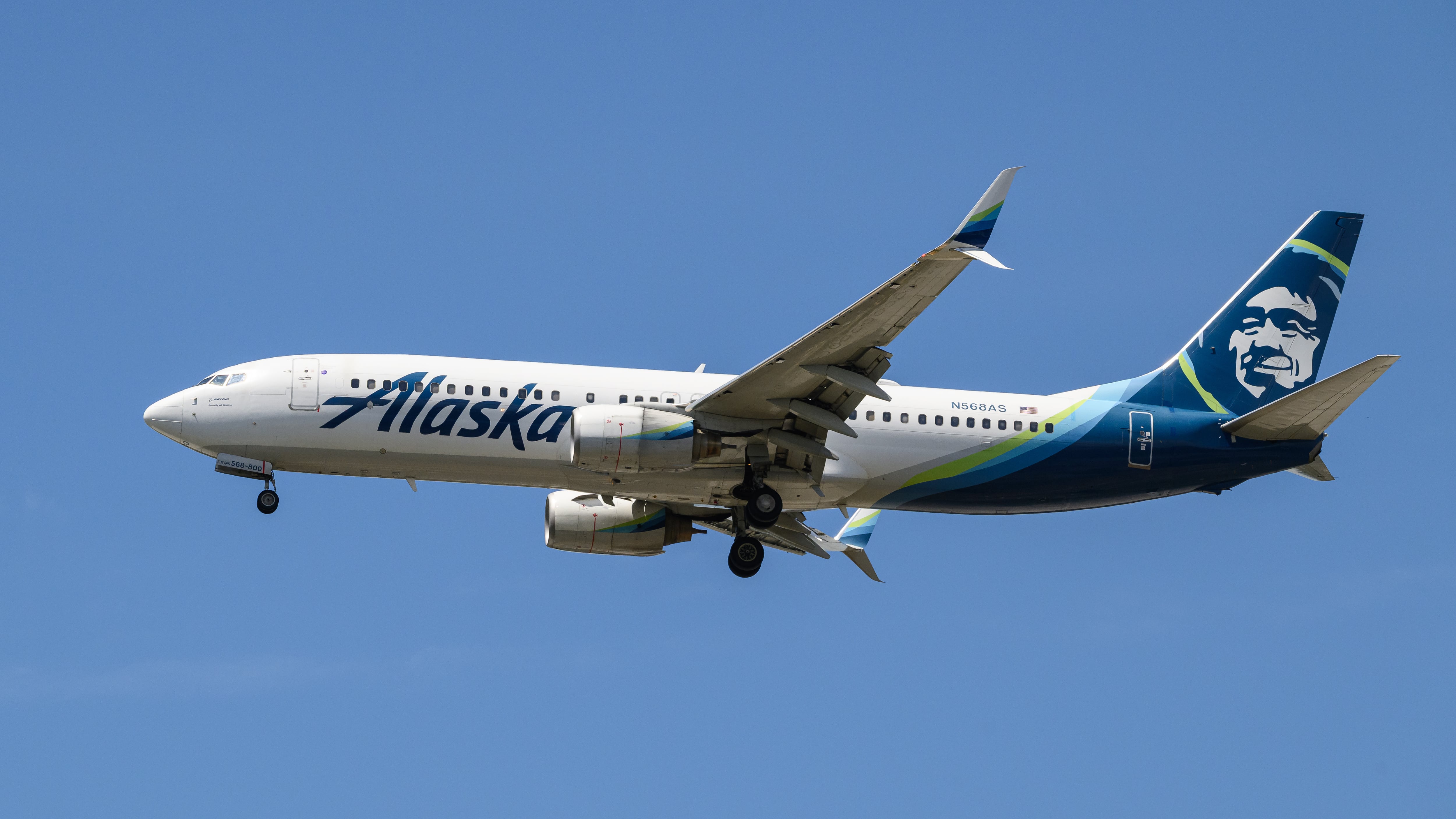 Alaska Airlines Boeing 737-800 with branding logo on approach to landing