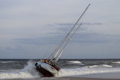 A sailboat got stuck on shore on Jacksonville Beach near 15th Avenue North near the Hampton Inn Jacksonville Beach/Oceanfront in the area of 1st Street North on Monday evening, 10/23/23.