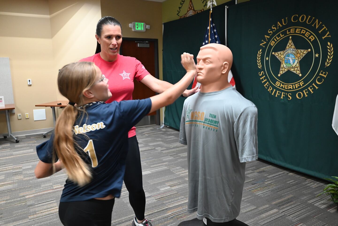Reunited friends during a self-defense class taught by Deputy Smith.