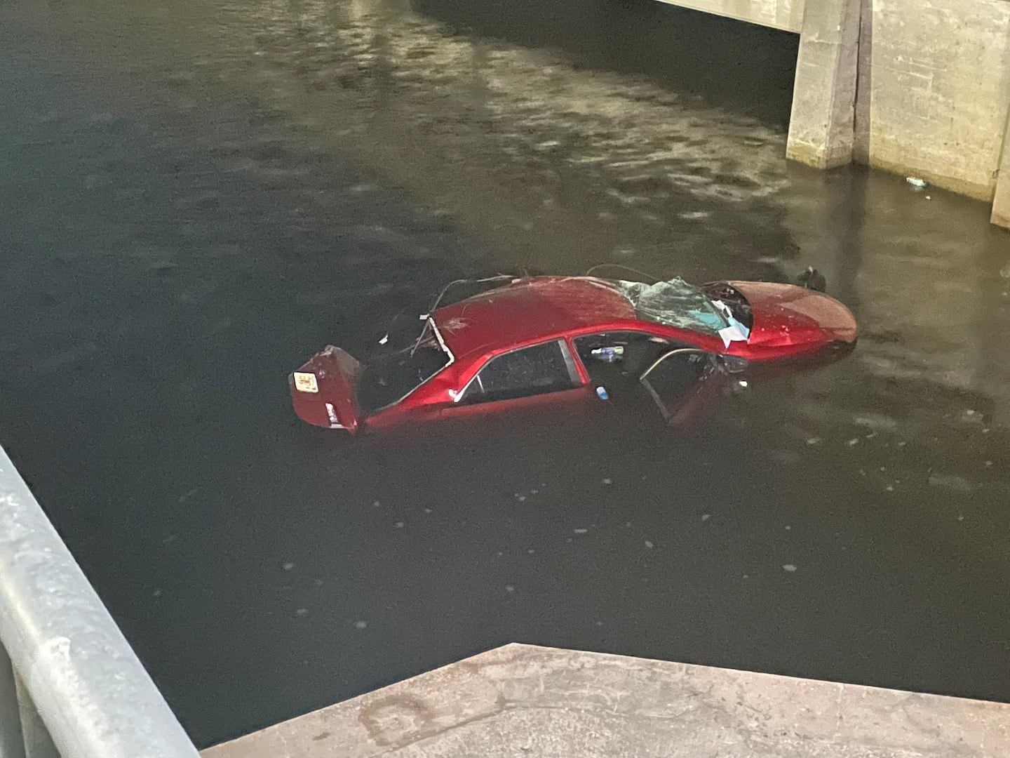 Car went off the road and into the Trout River.