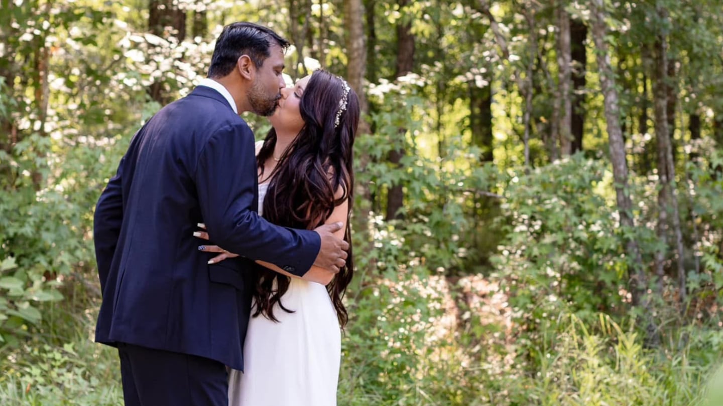 Tapan Purohit and Ashley Kennedy-Purohit on their wedding day.