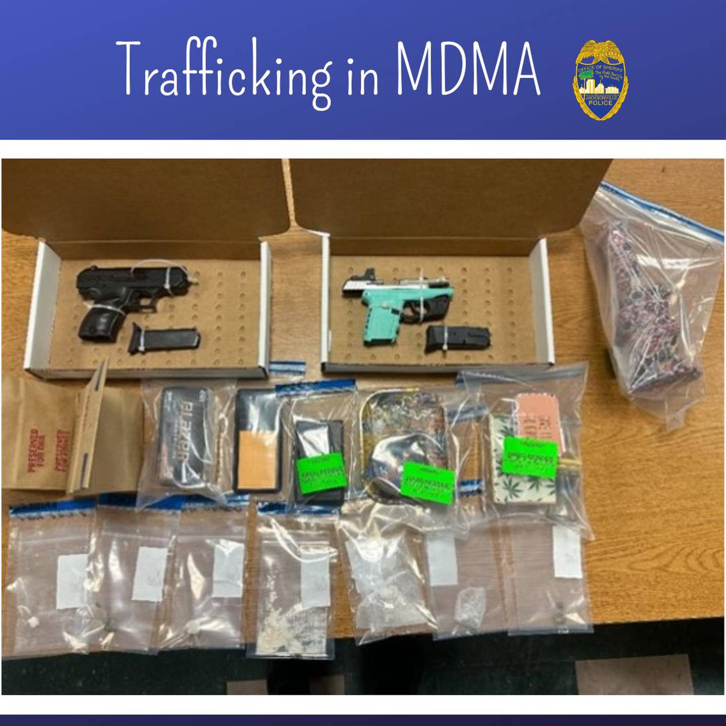 During a traffic stop officers seized two firearms, MDMA, marijuana, and drug paraphernalia.